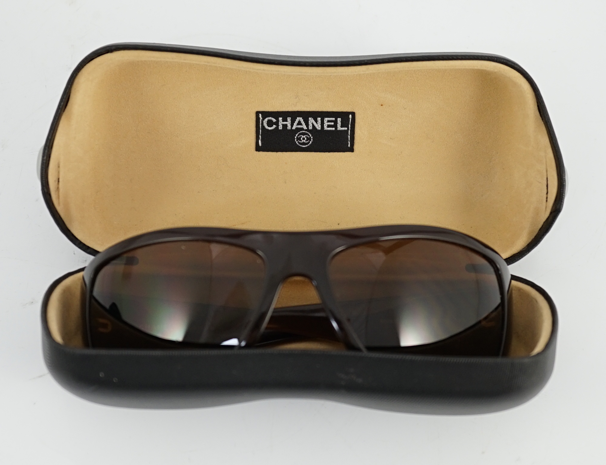A pair of Chanel brown sunglasses